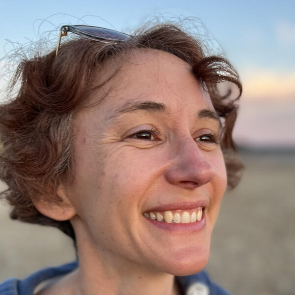 a person writing in a journal